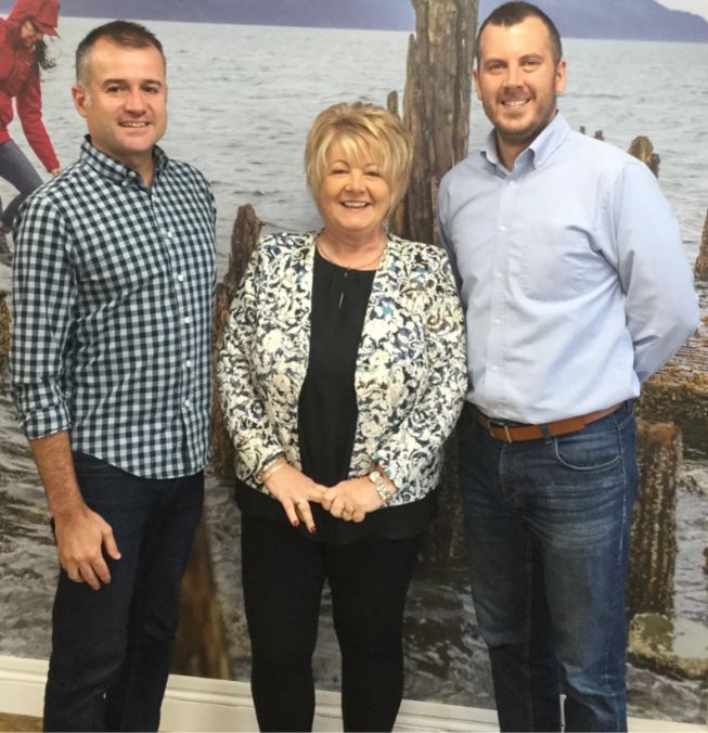 ABOVE: Sue with Account Managers Phil Tiney and Dan Rogers